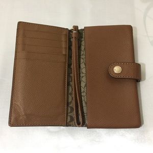 Coach Accessories - coach phone wallet with card slots. Coach Accessories - coach phone wallet with card slots.